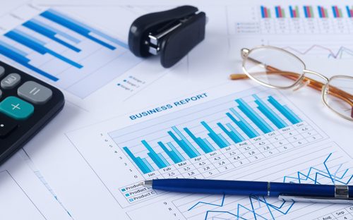 Business report showing graphs and income report growth data